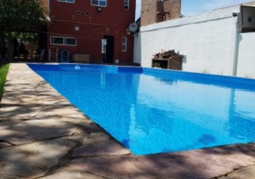 Casa alquiler temporario en Funes - 3 habitaciones con piscina 